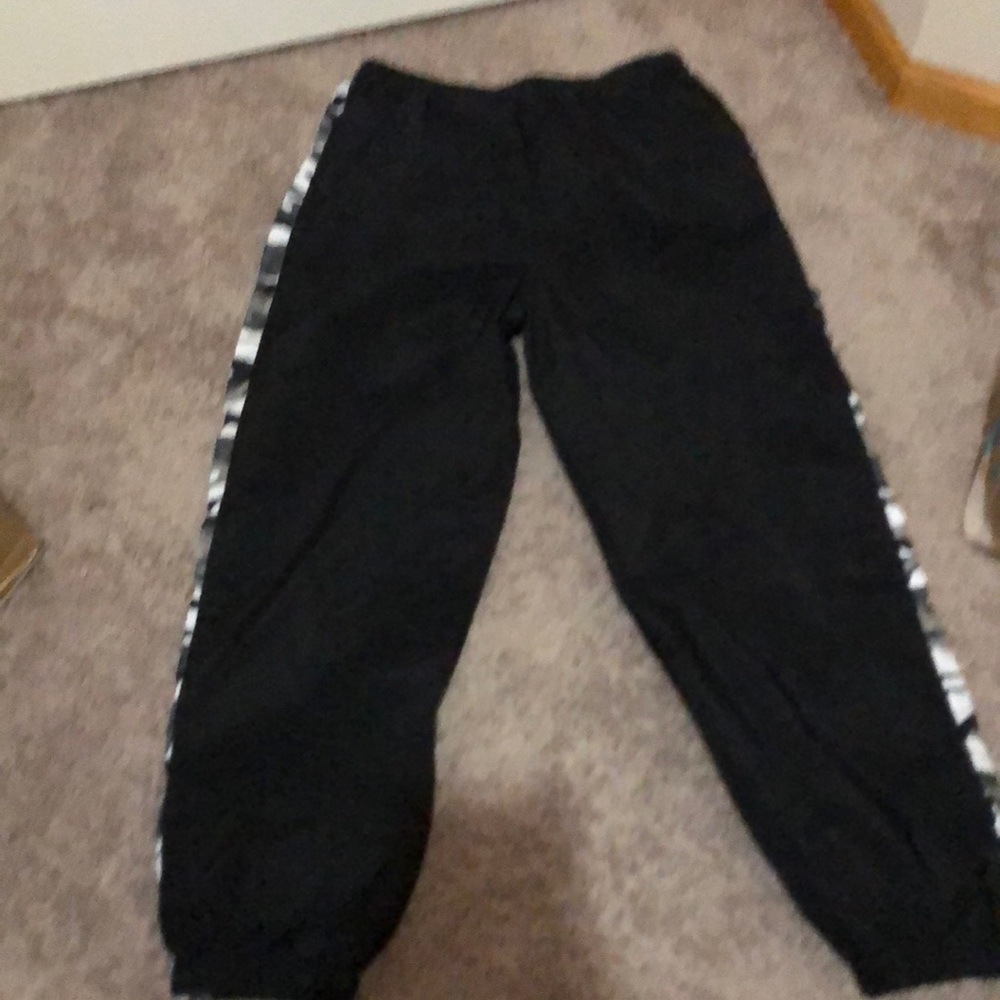 Black and camo windbreak pants